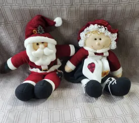 Pair of Vintage Avon Mr. And Mrs. Claus Musical Sitter Dolls